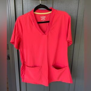 Women’s Landau Scrubs.  Size large top and bottom.  Color is Tea Berry.